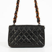 Authentic pre-loved Chanel Black Tortoiseshell Small Classic Flap Bag on Labellov.com