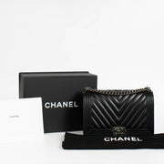 Authentic pre-loved Chanel Black Chevron Calfskin Large Boy Chanel Bag on Labellov.com