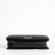 Authentic pre-loved Chanel Black Chevron Calfskin Large Boy Chanel Bag on Labellov.com