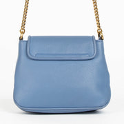 Authentic pre-loved Gucci Blue Leather 1973 Mini Crossbody Bag on Labellov.com
