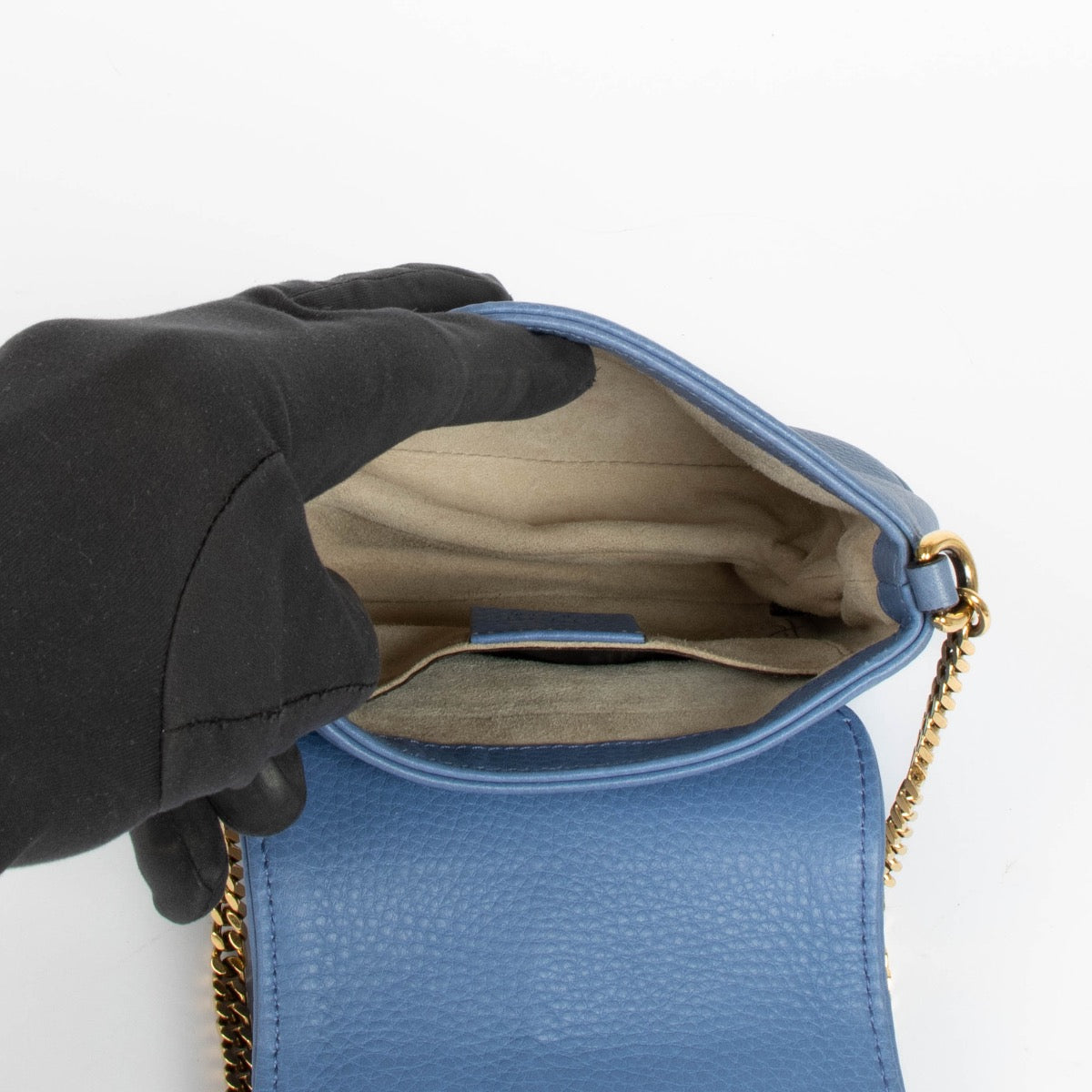 Authentic pre-loved Gucci Blue Leather 1973 Mini Crossbody Bag on Labellov.com