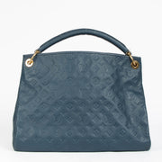 Authentic pre-loved Louis Vuitton Blue Monogram Empreinte Artsy MM Shoulder Bag on Labellov.com