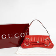 Authentic pre-loved Gucci Red Leather Medium Horsebit Chain Clutch on Labellov.com