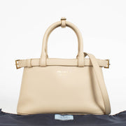 Authentic pre-loved Prada Travetine Leather Small Buckle Double Belt Bag on Labellov.com