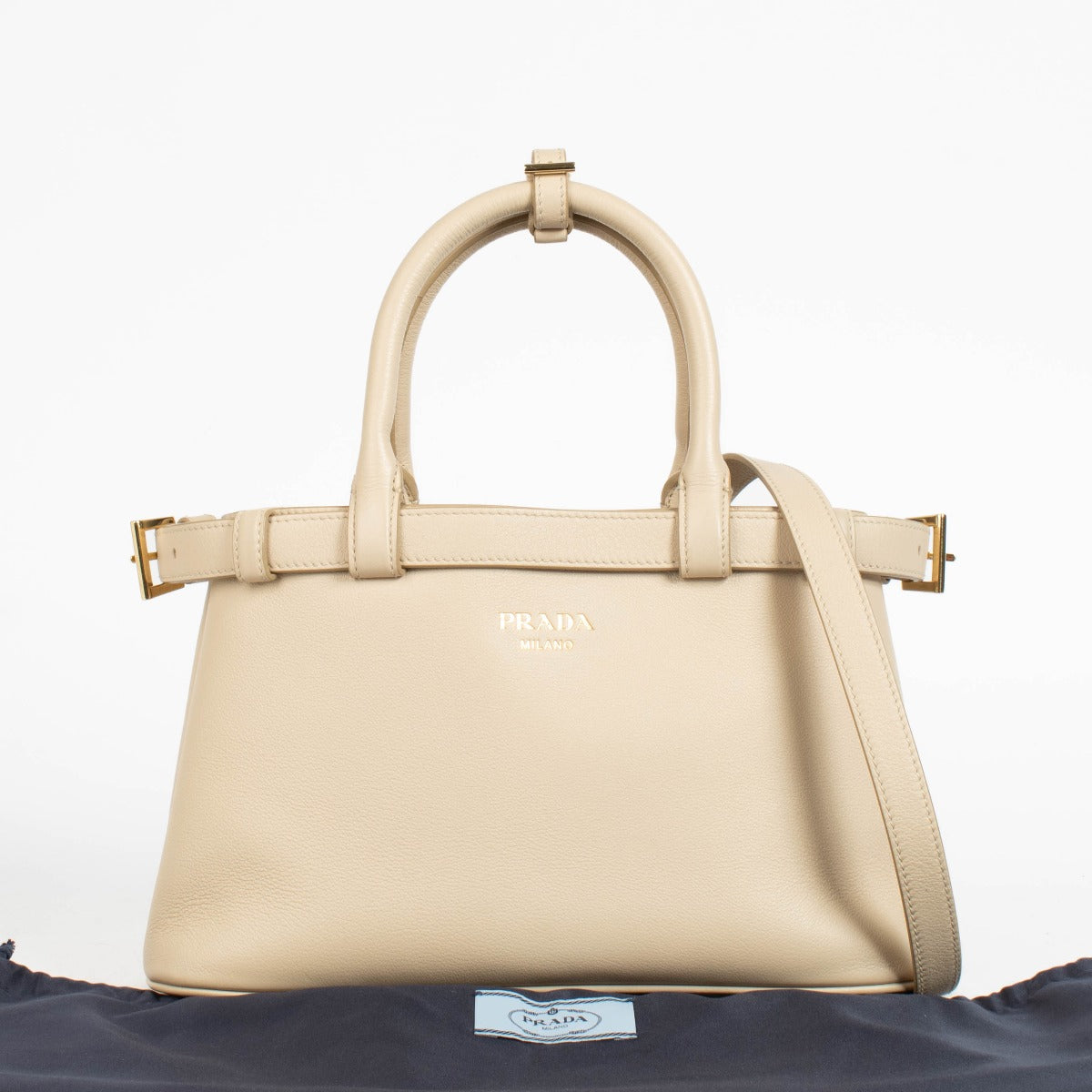 Authentic pre-loved Prada Travetine Leather Small Buckle Double Belt Bag on Labellov.com