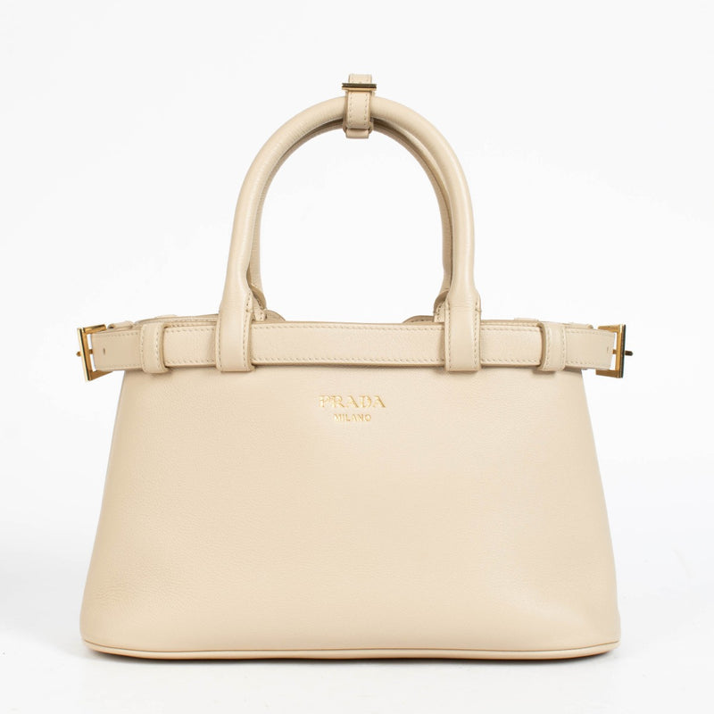 Authentic pre-loved Prada Travetine Leather Small Buckle Double Belt Bag on Labellov.com