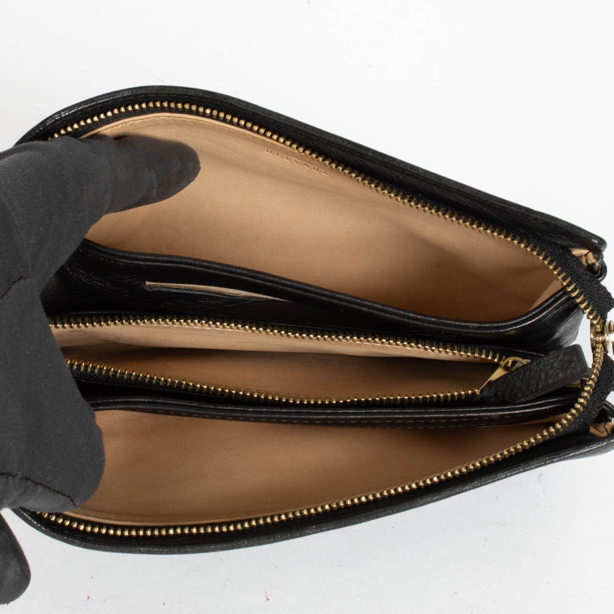 Authentic pre-loved Delvaux Black Leather Zipped Pouch on Labellov.com