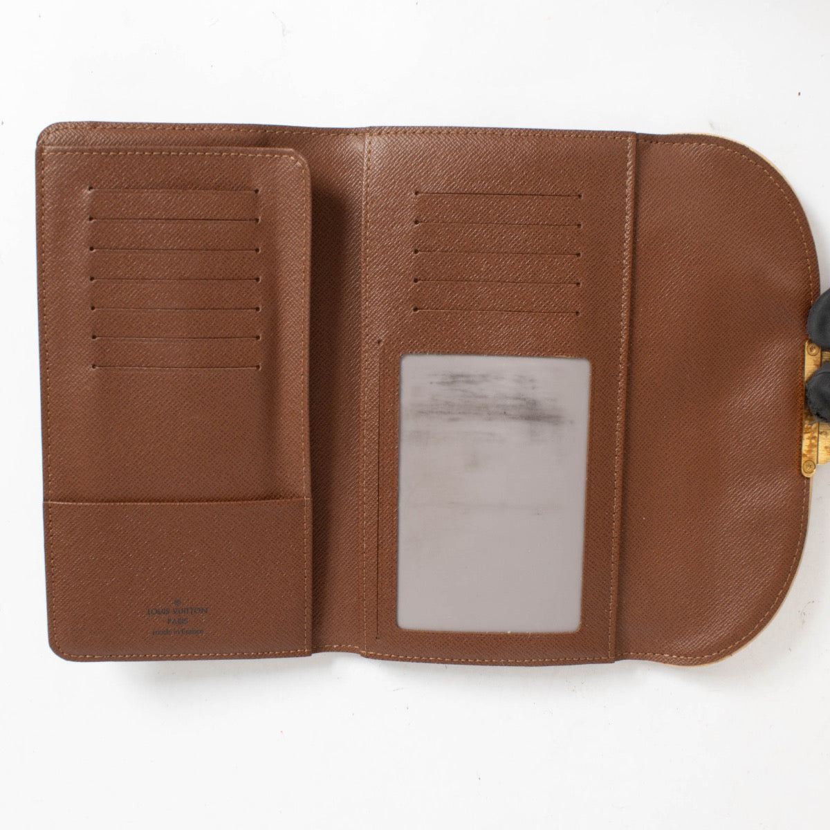 Authentic pre-loved Louis Vuitton Monogram Eugenie Wallet on Labellov.com