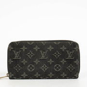 Authentic pre-loved Louis Vuitton Black Monogram Denim Zippy Wallet on Labellov.com