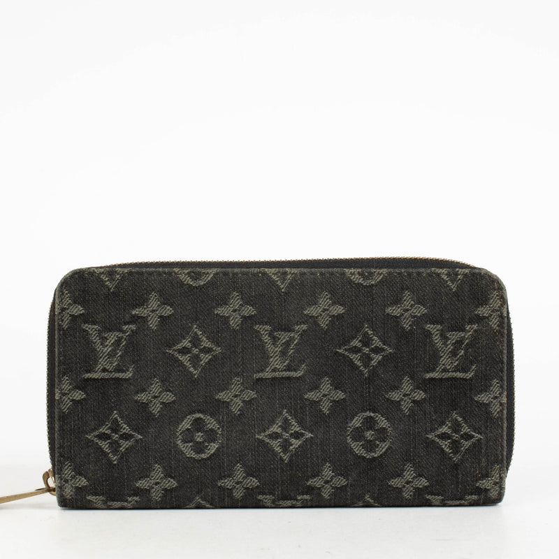 Authentic pre-loved Louis Vuitton Black Monogram Denim Zippy Wallet on Labellov.com