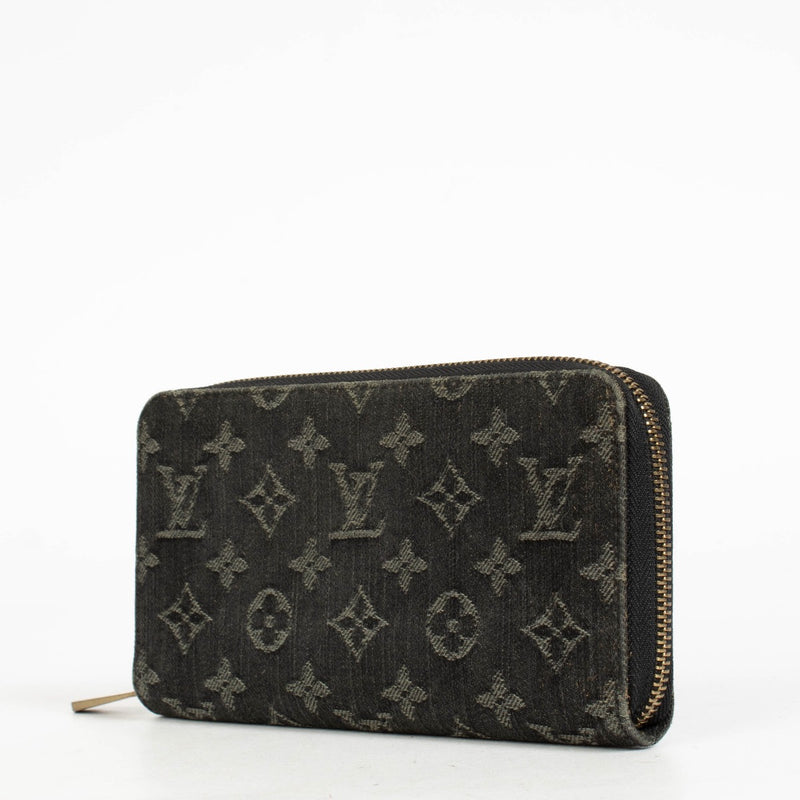 Authentic pre-loved Louis Vuitton Black Monogram Denim Zippy Wallet on Labellov.com