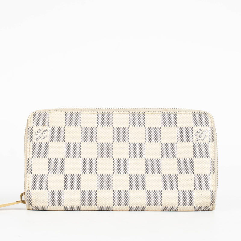 Authentic pre-loved Louis Vuitton Damier Azur Zippy Wallet on Labellov.com