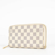 Authentic pre-loved Louis Vuitton Damier Azur Zippy Wallet on Labellov.com