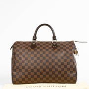 Authentic pre-loved Louis Vuitton Damier Ebene Speedy 35 on Labellov.com