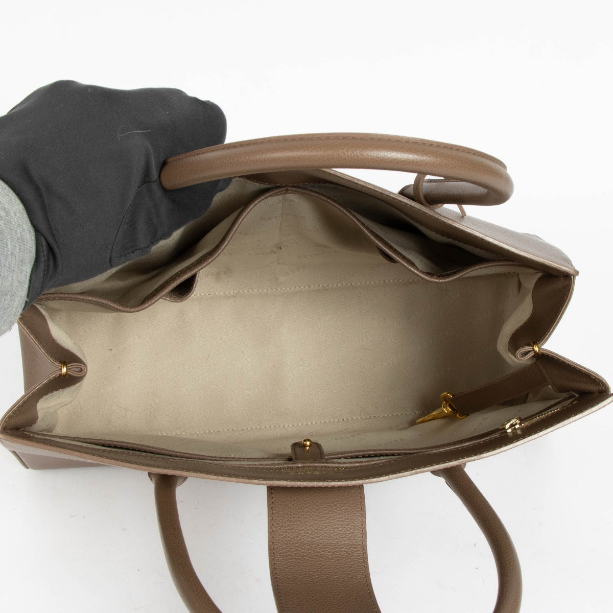 Shop this authentic Delvaux Taupe Jumping Brillant Cabrilot Bag pre-loved on Labellov.com