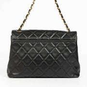 Authentic pre-loved Chanel Black Quilted Lambskin Large Vintage Flap Bag on Labellov.com