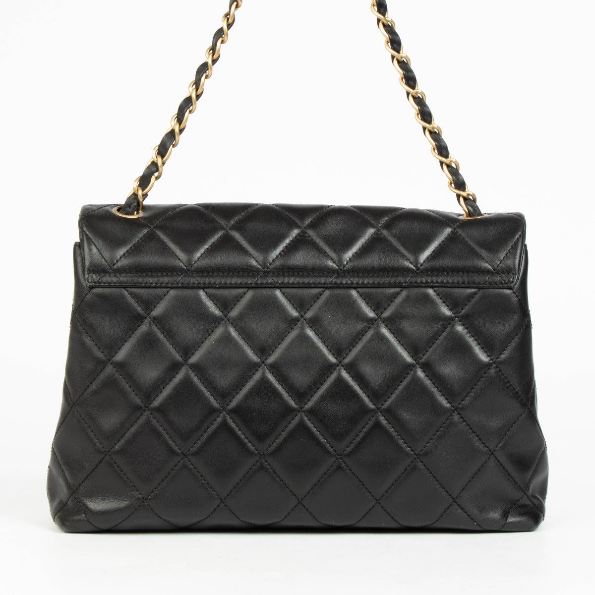 Authentic pre-loved Chanel Black Quilted Lambskin Large Vintage Flap Bag on Labellov.com