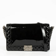 Authentic pre-loved Chanel Black Patent Leather Large Boy Chanel Bag on Labellov.com