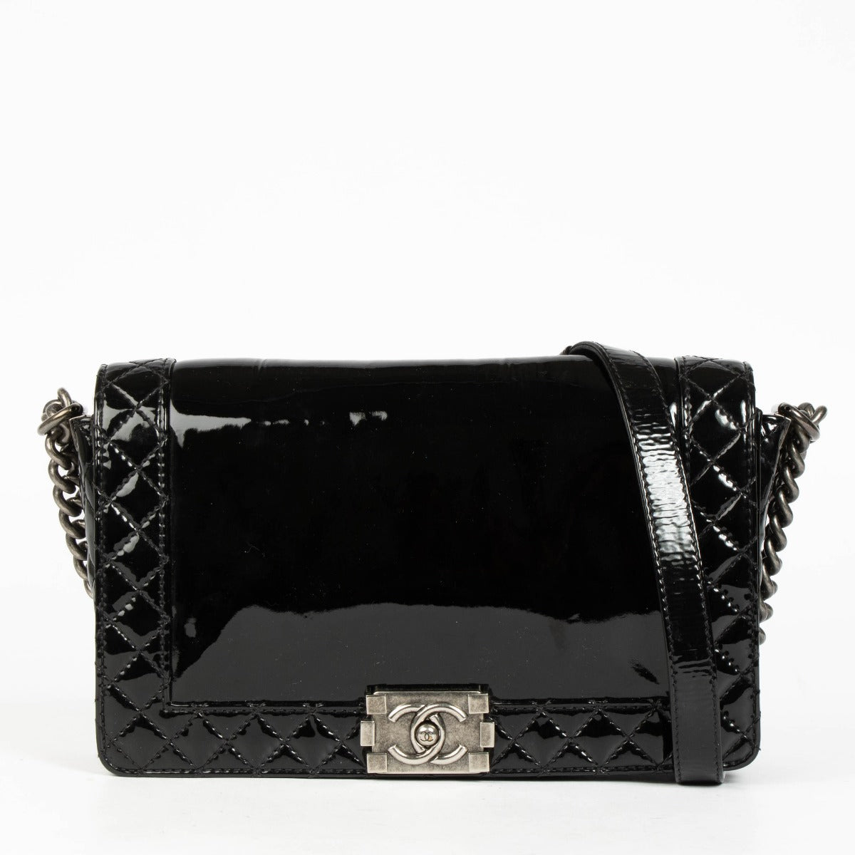 Authentic pre-loved Chanel Black Patent Leather Large Boy Chanel Bag on Labellov.com
