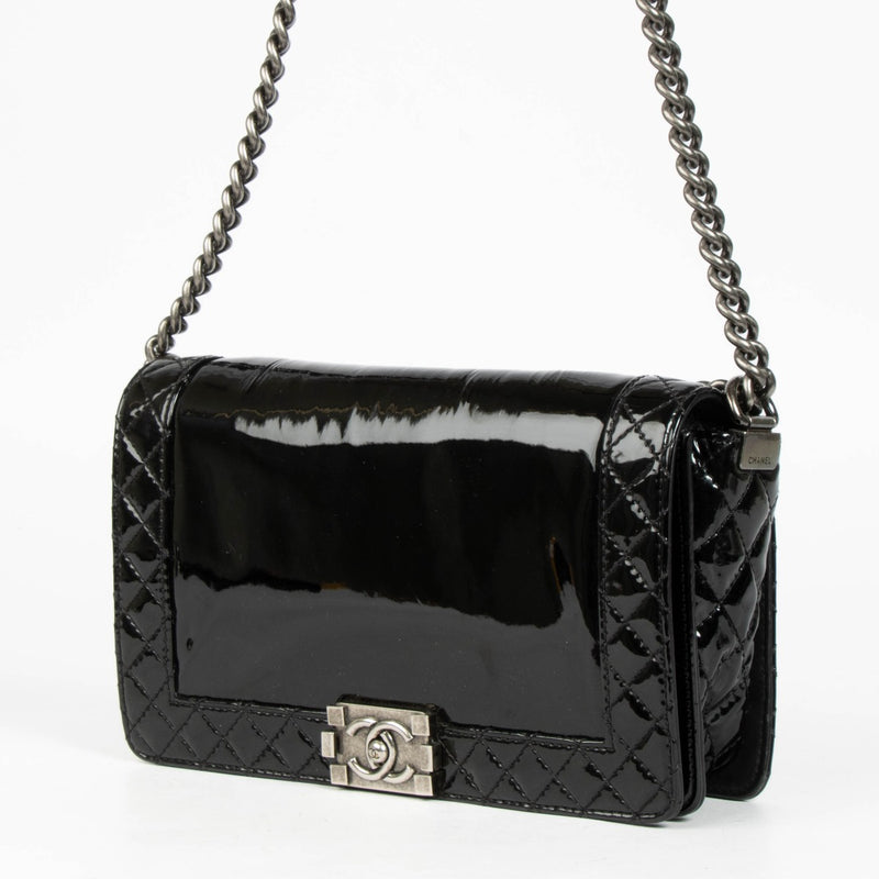 Authentic pre-loved Chanel Black Patent Leather Large Boy Chanel Bag on Labellov.com