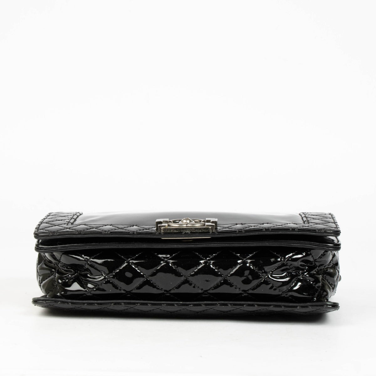 Authentic pre-loved Chanel Black Patent Leather Large Boy Chanel Bag on Labellov.com