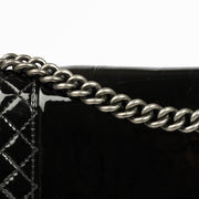Authentic pre-loved Chanel Black Patent Leather Large Boy Chanel Bag on Labellov.com