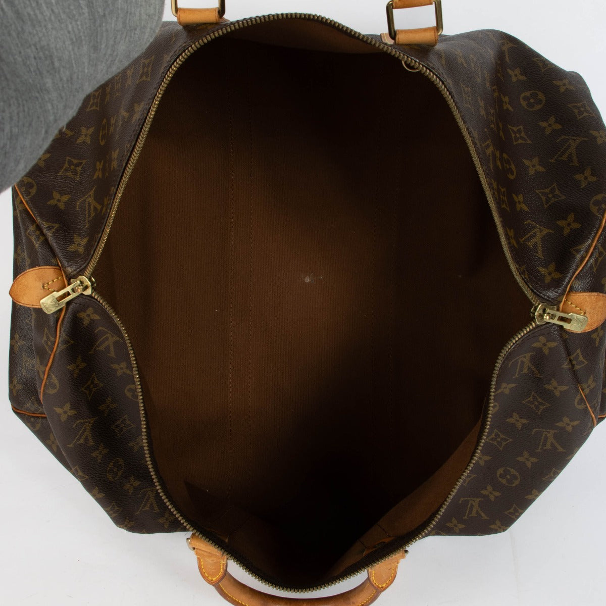 Authentic pre-loved Louis Vuitton Damier Ebene Keepall 55 on Labellov.com