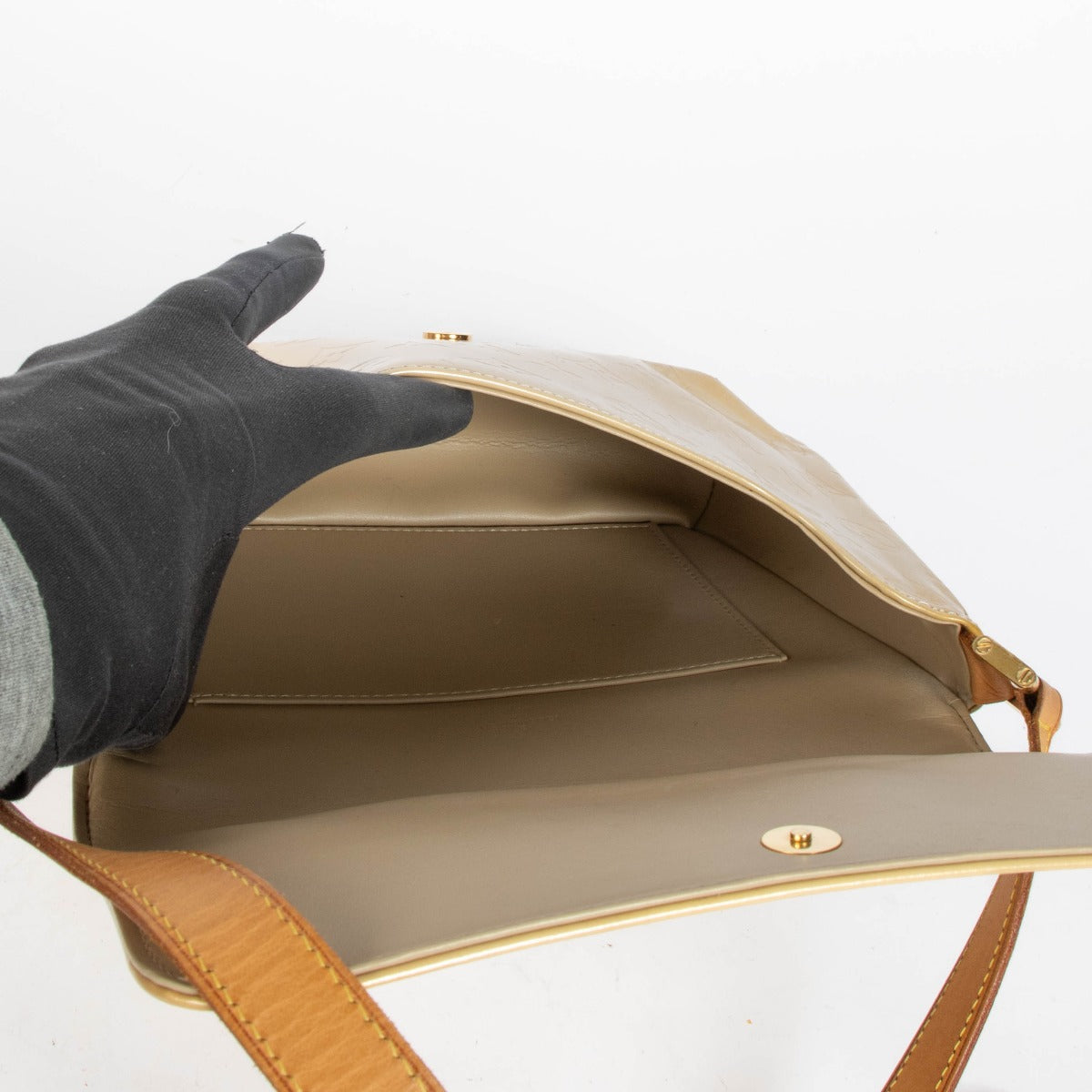 Shop this authentic Louis Vuitton Light Beige Thompson Shoulder Bag pre-loved on Labellov.com