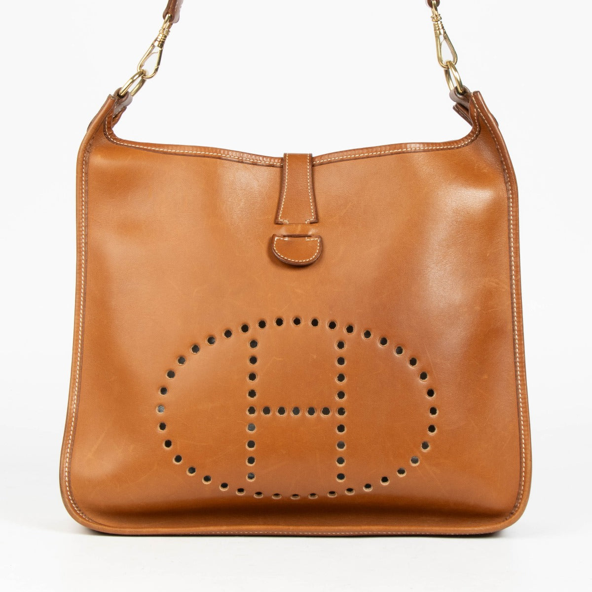 Shop this authentic Hermès Evelyne 33 Fauve Barenia GHW Crossbody pre-loved on Labellov.com