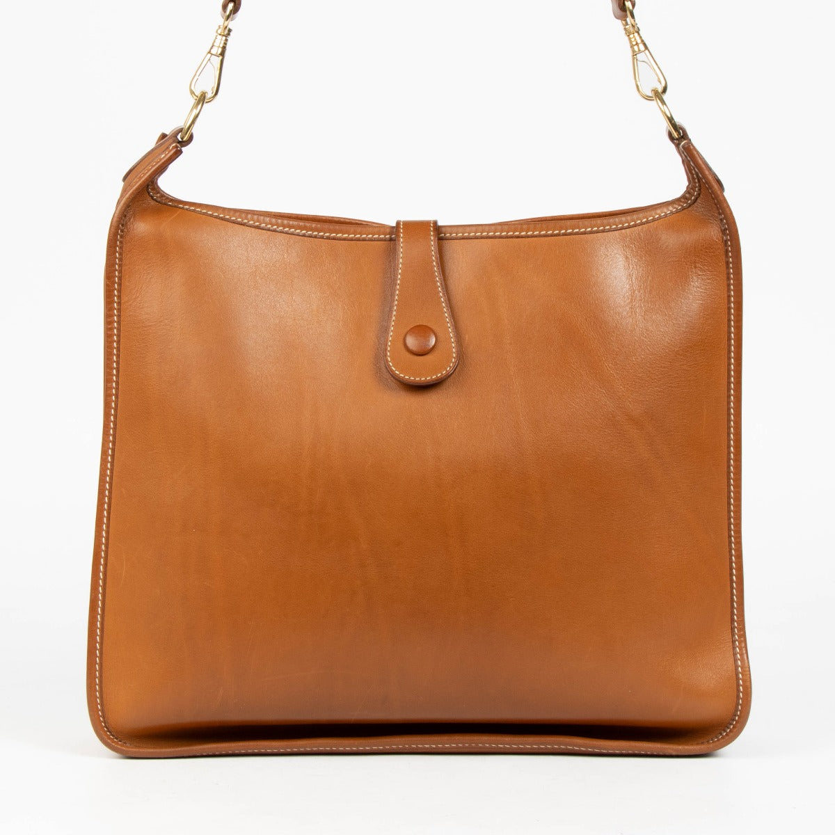 Shop this authentic Hermès Evelyne 33 Fauve Barenia GHW Crossbody pre-loved on Labellov.com