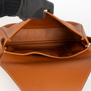 100% authentic second hand Hermès Gold Fjord Leather Large Christine Envelope Bag at Labellov.