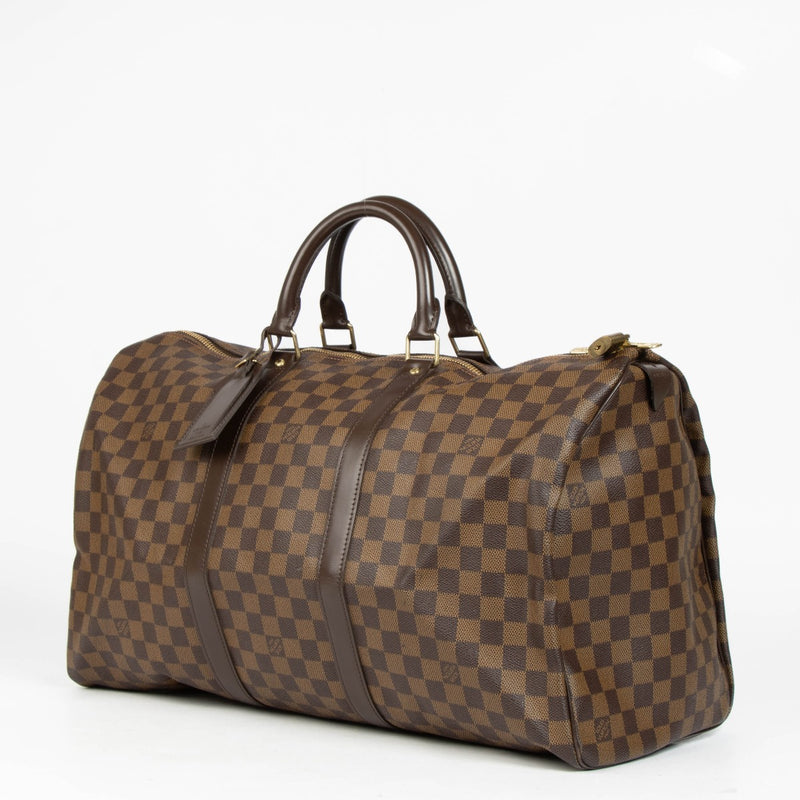 Shop the authentic Louis Vuitton Brown Damier Ebene Keepall Bandoulière 50 second hand on Labellov.com