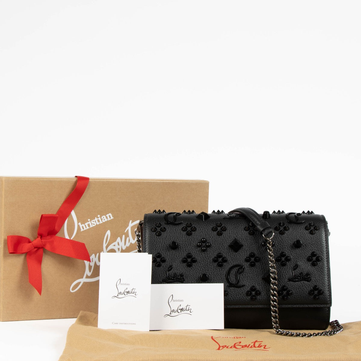 Authentic pre-loved Christian Louboutin Black Calfskin Leather Spikes Paloma Crossbody Bag on Labellov.com