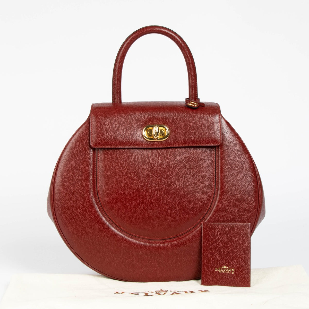 Shop this 100% authentic Delvaux Red Leather Vintage Extase Top Handle Bag at labellov.com