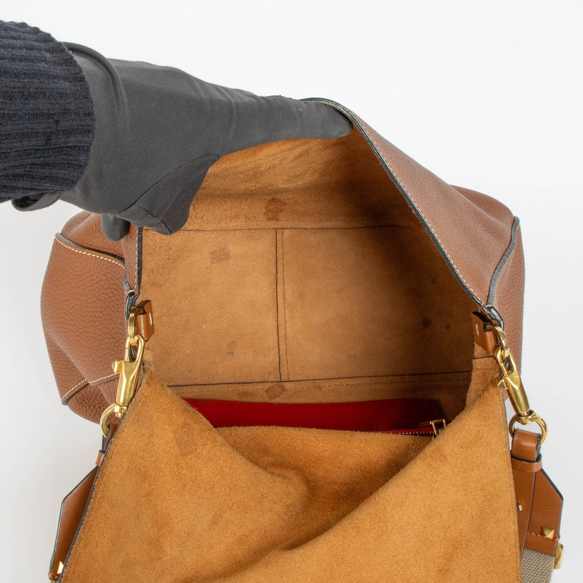 Authentic pre-loved Valentino Garavani Vring Cognac Crossbody Bag on Labellov.com