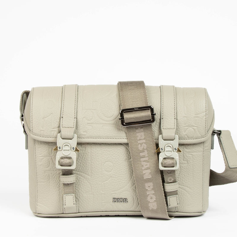 Shop this 100% authentic Christian Dior Beige Hit the Road Messenger Bag at labellov.com.