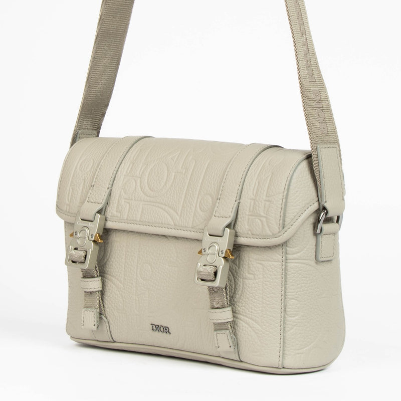 Shop this 100% authentic Christian Dior Beige Hit the Road Messenger Bag at labellov.com.