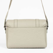 Shop this 100% authentic Christian Dior Beige Hit the Road Messenger Bag at labellov.com.