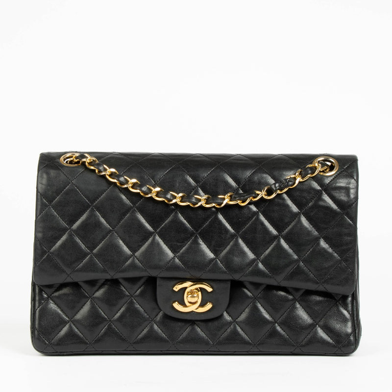 Shop this authentic Chanel 1980s Black Medium Classic Flap Bag pre-loved on Labellov.com