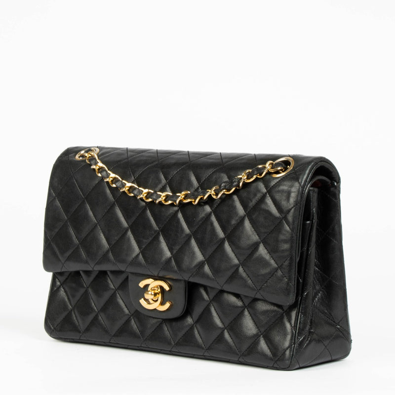 Shop this authentic Chanel 1980s Black Medium Classic Flap Bag pre-loved on Labellov.com