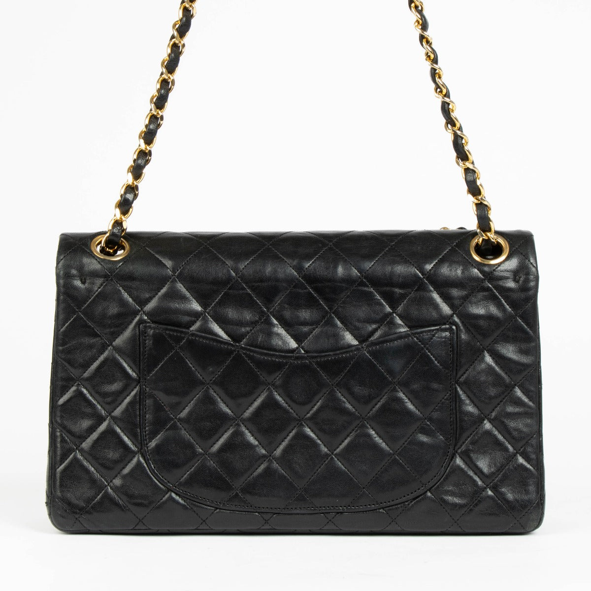 Shop this authentic Chanel 1980s Black Medium Classic Flap Bag pre-loved on Labellov.com