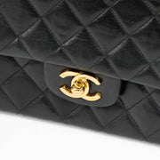 Shop this authentic Chanel 1980s Black Medium Classic Flap Bag pre-loved on Labellov.com