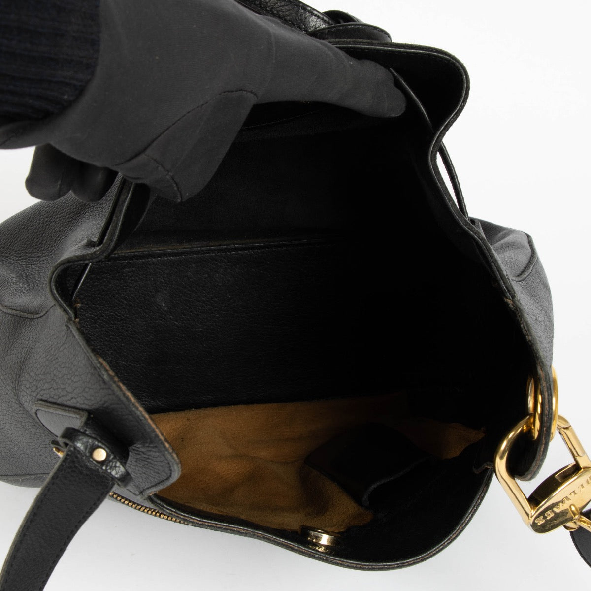 Authentic pre-loved Delvaux Black Leather Vintage Hobo Bag on Labellov.com