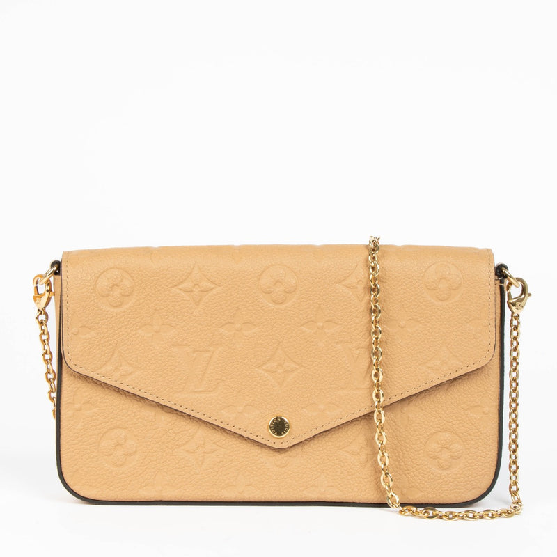 Authentic pre-loved Louis Vuitton Monogram Empreinte Pochette Felicie Crossbody Bag on Labellov.com