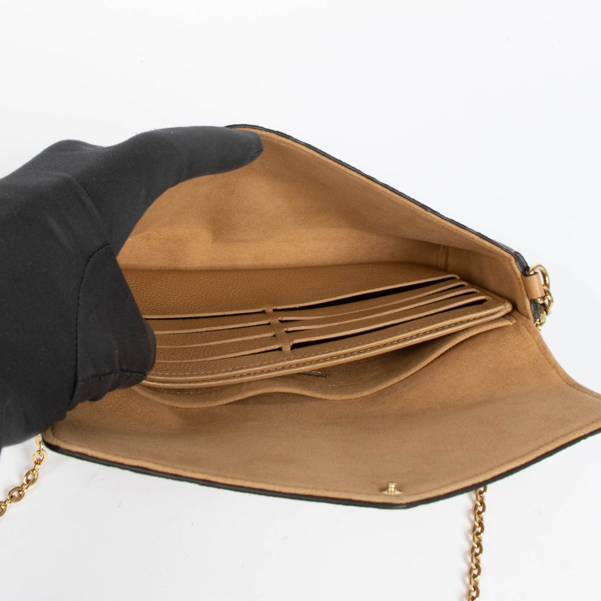Authentic pre-loved Louis Vuitton Monogram Empreinte Pochette Felicie Crossbody Bag on Labellov.com