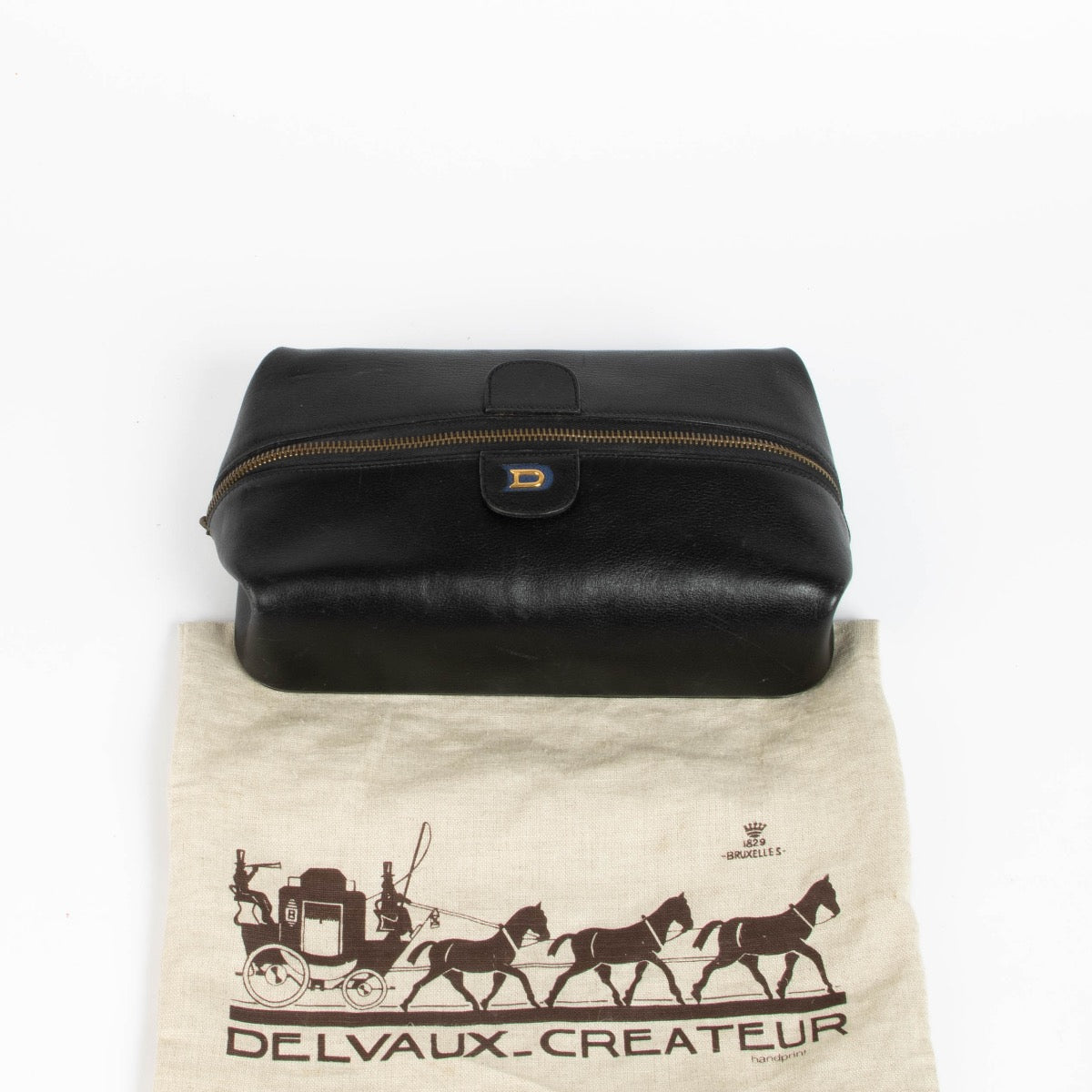 Authentic pre-loved Delvaux Black Toiletry Pouch Clutch on Labellov.com
