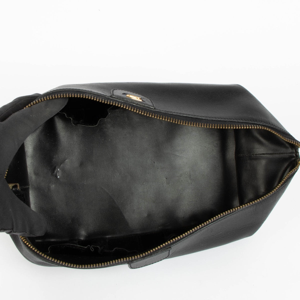 Authentic pre-loved Delvaux Black Toiletry Pouch Clutch on Labellov.com