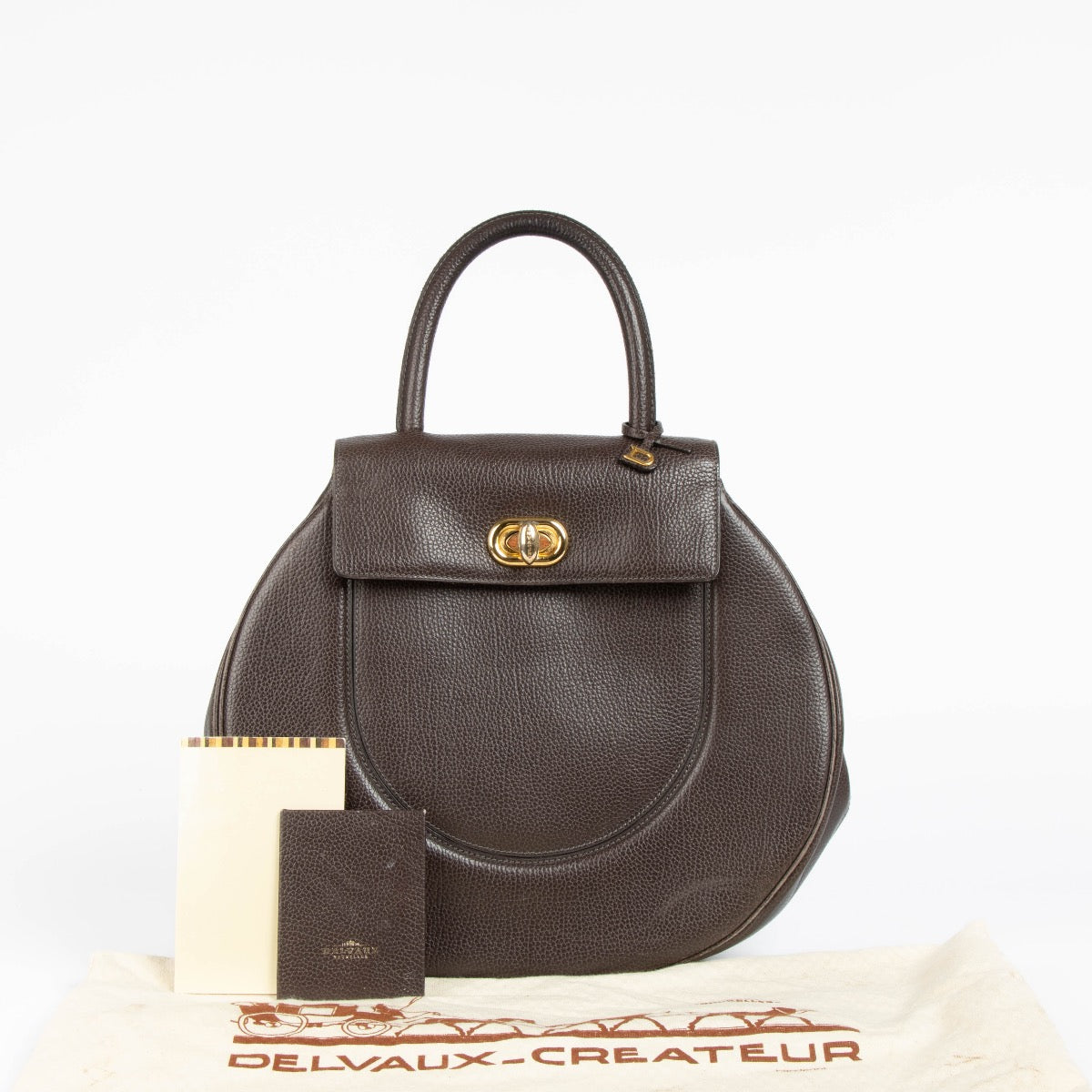 Authentic pre-loved Delvaux Brown Gallop Extase Top Handle Bag on Labellov.com