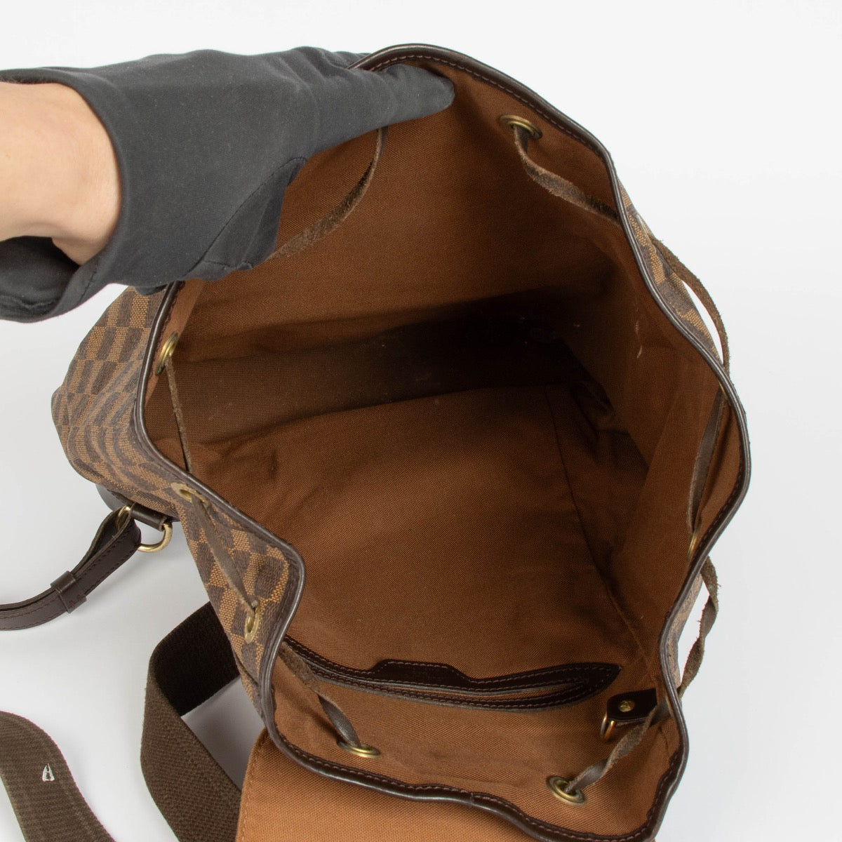 Authentic pre-loved Louis Vuitton Damier Ebene Montsouris GM Backpack on Labellov.com