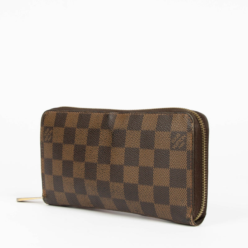 Shop this authentic Louis Vuitton Damier Ebene Zippy Wallet pre-loved on Labellov.com